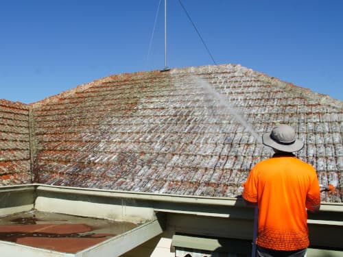 pre-painted roof being treated